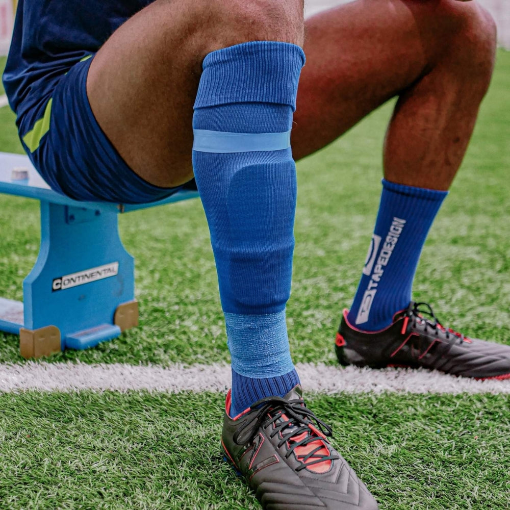 Blue football sock wrap on player